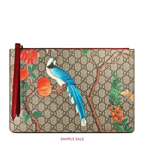 gucci supreme zip pouch